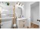 Bright bathroom features modern fixtures, stylish shelves, and ample storage space at 2829 9Th W Ave, Bradenton, FL 34205