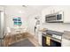 Bright dining area with modern decor and views into other living spaces at 2829 9Th W Ave, Bradenton, FL 34205