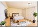 Bright bedroom with a bed, large windows and adjacent closets at 2912 N 29Th St, Tampa, FL 33605