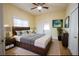 Bedroom features a modern ceiling fan and a door that leads to a private outdoor space at 2912 N 29Th St, Tampa, FL 33605