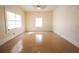 Bright empty room with tile floor and multiple windows at 2912 N 29Th St, Tampa, FL 33605