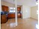 Bright eat-in kitchen featuring dark wood cabinetry and stylish backsplash at 2912 N 29Th St, Tampa, FL 33605
