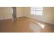 Bright living room featuring tile floors and a large window allowing for ample natural light at 2912 N 29Th St, Tampa, FL 33605