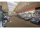 Well-equipped fitness center with modern exercise machines for a complete workout experience at 304 Silver Falls Dr, Apollo Beach, FL 33572