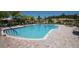 Relax and enjoy the beautiful community pool with plenty of room to swim and lounge in the sun at 304 Silver Falls Dr, Apollo Beach, FL 33572