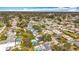Real estate showcasing beautiful properties with lush landscaping, a large home and an aerial view of the neighborhood at 3124 61St N Ln, St Petersburg, FL 33710