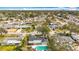 Real estate showcasing beautiful properties with lush landscaping and an aerial view of the neighborhood at 3124 61St N Ln, St Petersburg, FL 33710