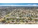 Wide aerial shot of a densely populated suburban area, highlighting numerous houses and community layouts at 3124 61St N Ln, St Petersburg, FL 33710