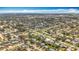 Panoramic aerial view of a residential area, featuring an array of homes, green spaces, and orderly street patterns at 3124 61St N Ln, St Petersburg, FL 33710