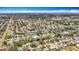 Expansive aerial view showcasing a well-planned residential neighborhood with lush greenery and diverse housing styles at 3124 61St N Ln, St Petersburg, FL 33710
