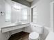 Cozy bathroom featuring a sleek vanity with a vessel sink and modern fixtures at 3124 61St N Ln, St Petersburg, FL 33710