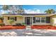 Well-maintained home with a neatly landscaped front yard and a welcoming entrance at 3124 61St N Ln, St Petersburg, FL 33710