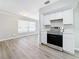Bright kitchen with stainless steel oven and white cabinets at 3124 61St N Ln, St Petersburg, FL 33710