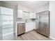 Modern kitchen featuring stainless steel dishwasher and refrigerator at 3124 61St N Ln, St Petersburg, FL 33710