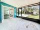 View of the patio with access to the home and overlooking the backyard pool at 3124 61St N Ln, St Petersburg, FL 33710