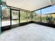 Screened patio offering an extended living space with views of the landscaped backyard at 3124 61St N Ln, St Petersburg, FL 33710