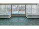 The sunroom features multiple windows overlooking the outdoor pool at 3124 61St N Ln, St Petersburg, FL 33710