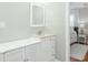 Well-lit bathroom featuring a vanity with storage and a neutral color scheme at 313 27Th N St, St Petersburg, FL 33713