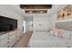 Spacious main bedroom features a decorative tray ceiling, plush carpeting and large dressers at 3133 King Fern Dr, Wimauma, FL 33598