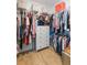 Bright walk-in closet with ample storage and built-in shelving at 33277 Rosewood Bark Way, Wesley Chapel, FL 33545
