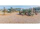 Fun community playground with slides, swings, and climbing structures offers enjoyment for all ages at 33277 Rosewood Bark Way, Wesley Chapel, FL 33545