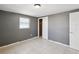 Bedroom with a large closet and tile flooring at 4037 Chesswood Dr, Holiday, FL 34691