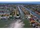 Expansive aerial view of canal-lined neighborhood with boats docked at many residences at 4464 46Th S Ave, St Petersburg, FL 33711