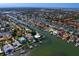 Aerial view of a waterside neighborhood featuring canals and many properties with boat docks at 4464 46Th S Ave, St Petersburg, FL 33711