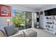 Bedroom with a cozy sitting area near the window with a view to the lovely, green backyard at 4464 46Th S Ave, St Petersburg, FL 33711