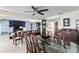 Formal dining room with glass table, decorative ceiling fan, and classic decor at 4464 46Th S Ave, St Petersburg, FL 33711