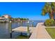 Dock with boat lift overlooking the canal at 4464 46Th S Ave, St Petersburg, FL 33711