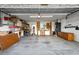 Spacious garage with ample storage, workbench area, and overhead lighting at 4464 46Th S Ave, St Petersburg, FL 33711