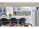 Cozy kitchen features bar stool seating and a view overlooking the waterfront at 4464 46Th S Ave, St Petersburg, FL 33711