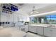 Well-lit kitchen with white cabinets and a window overlooking the water at 4464 46Th S Ave, St Petersburg, FL 33711
