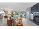 Open living room with tile floors and sliding glass doors to the pool at 4464 46Th S Ave, St Petersburg, FL 33711