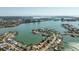Elevated perspective showcasing the waterfront community with stunning water views and lush surroundings at 448 79Th S St, St Petersburg, FL 33707