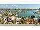 Charming waterfront property with a large backyard and private dock, offering direct access to the bay and stunning views at 448 79Th S St, St Petersburg, FL 33707