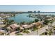 Aerial view of a waterfront home showcasing its location, private dock, and proximity to the water at 448 79Th S St, St Petersburg, FL 33707