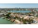 Beautiful waterfront home with a private dock and a sandy beach area, perfect for enjoying the waterfront lifestyle at 448 79Th S St, St Petersburg, FL 33707