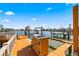 Dock with a convenient outdoor sink and counter area, ideal for cleaning the catch of the day at 448 79Th S St, St Petersburg, FL 33707