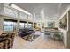 Bright living room with water views, tiled floors, and comfortable seating at 448 79Th S St, St Petersburg, FL 33707