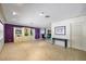 Expansive living room showcasing terrazzo floors and views into the dining area, perfect for entertaining at 448 79Th S St, St Petersburg, FL 33707