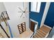 Grand foyer with high ceilings, modern light fixture, and stylish front door at 4604 W Lowell Ave, Tampa, FL 33629