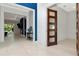 Open living area with a fireplace and view to the backyard at 4604 W Lowell Ave, Tampa, FL 33629