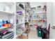 Walk-in pantry with ample shelving for storage at 4604 W Lowell Ave, Tampa, FL 33629