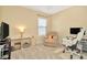 Bright bedroom with a work station, chair, and computer setup at 6208 Forrestal Dr, Tampa, FL 33625
