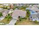 Charming home with a well-manicured front yard, mature trees, and a two-car garage at 6208 Forrestal Dr, Tampa, FL 33625