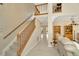A grand entrance with staircase, tile floors, and neutral paint colors at 6208 Forrestal Dr, Tampa, FL 33625