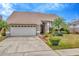 This is a nice single Gathering home that features a two car garage and mature landscaping at 6208 Forrestal Dr, Tampa, FL 33625