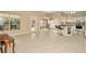 Open-concept living space with views into the kitchen and out to the screened patio at 6208 Forrestal Dr, Tampa, FL 33625